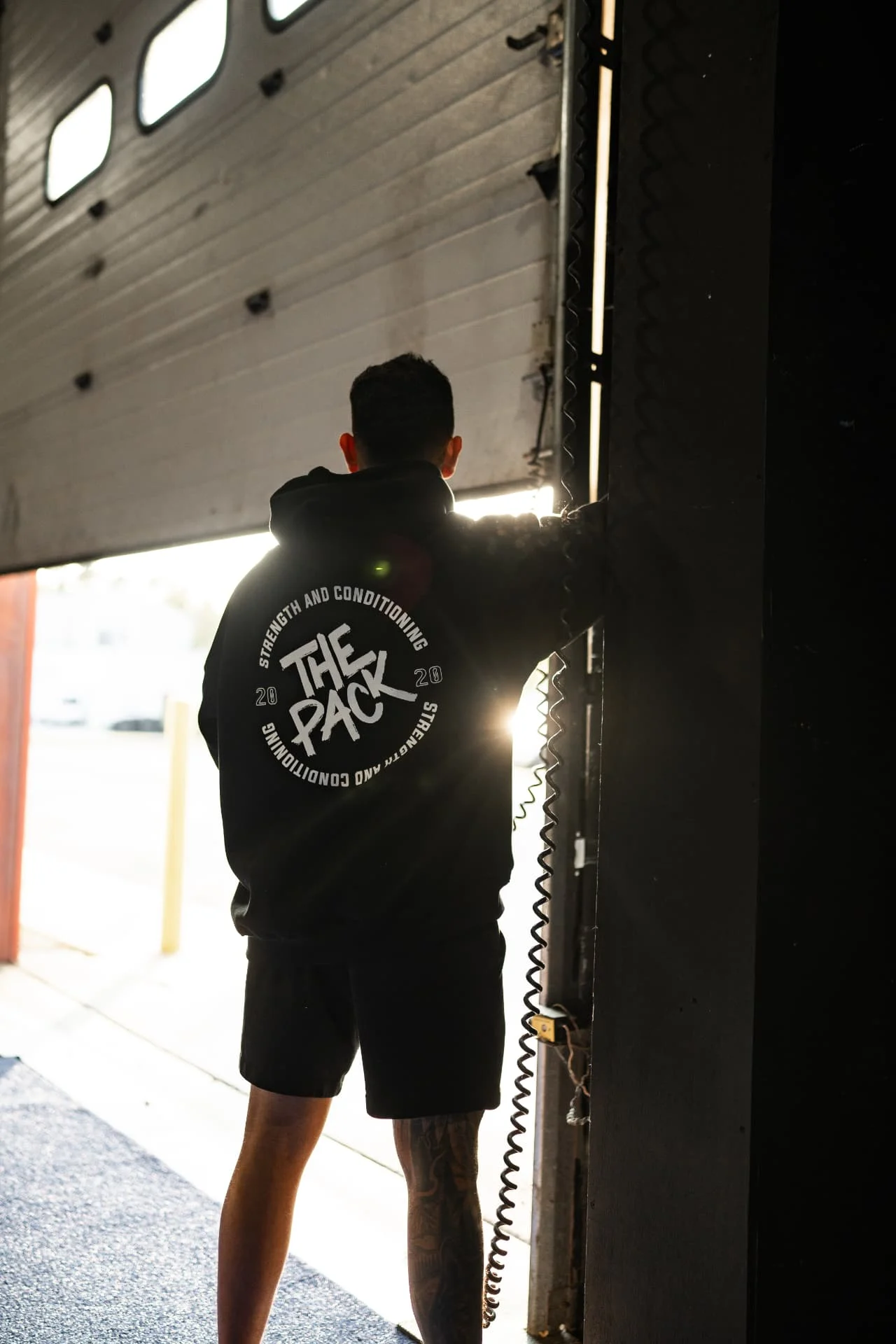Athlete opening the bay door at The Pack